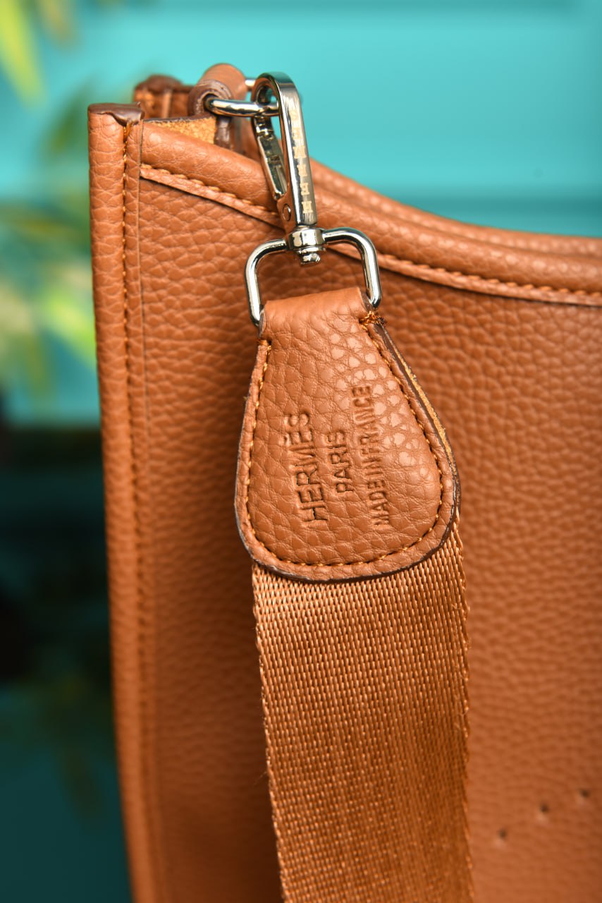 '- Evelyne Crossbody