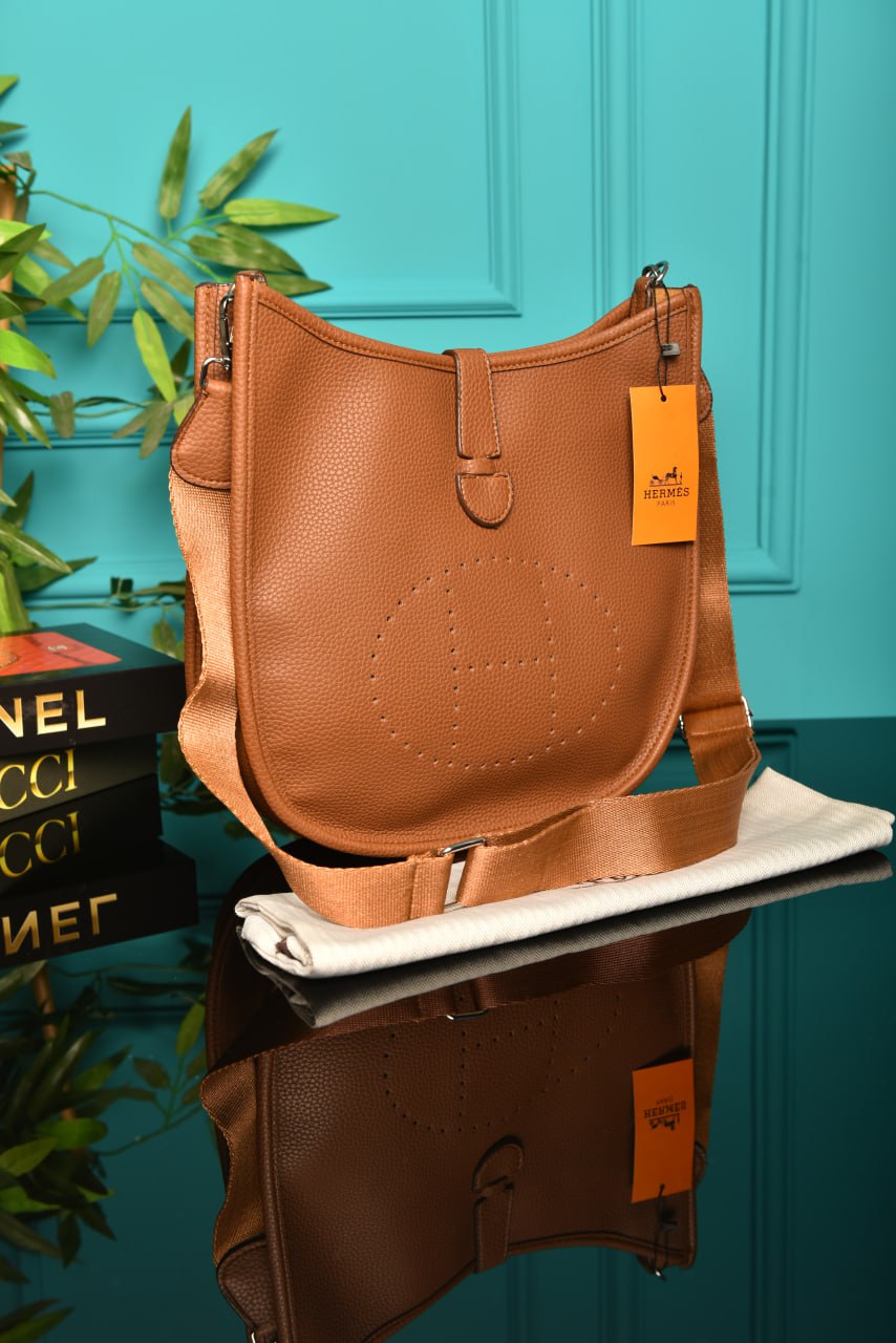 '- Evelyne Crossbody